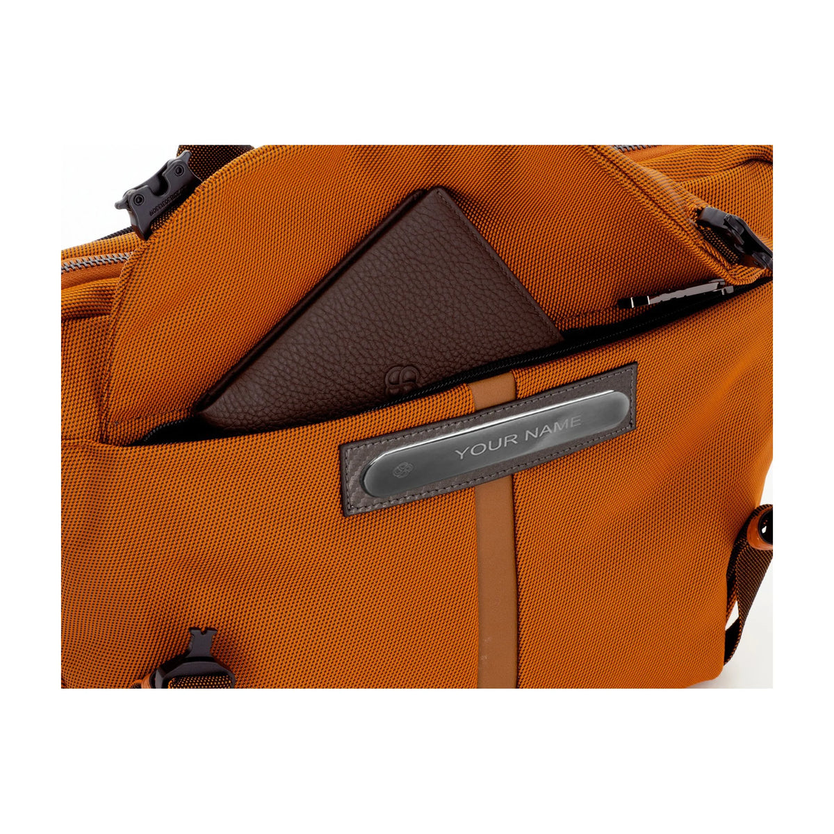 Dettaglio finiture e hardware di BELL X-1 - Scharlau First Class Marsupio - Arancia